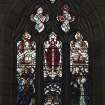 Interior. Chancel. Detail of stained glass 3-light pointed arch window to E gable
