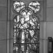 Interior. Chancel. Detail of stained glass window with cusped detailling on S elevation