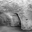 Interior.
Ground floor, central vaulted chamber, S wall from NW.