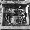 Detail of armorial panel in E wall.