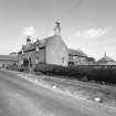 General view from SW of farmhouse and steading.