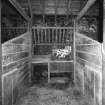 Interior.
Detail of stable stall.