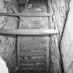 Interior.
View of water wheel which powered threshing machine.