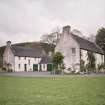 View of  garage and cottage block from SW