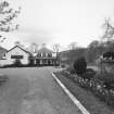 View from SSW showing main entrance and 1930's 'Crook Hotel' sign attributed to Thomas Haddon and Company.