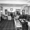 Interior.
Lounge, view from E looking towards the c. 1970 fireplace.