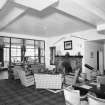 Interior.
Lounge, view from NE looking through glazed screen to dining room.