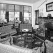 Interior.
Lounge, view from NNE looking through glazed screen to dining room.