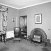 Interior.
Private sitting room, view from NW showing 1930's brick fireplace.