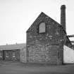 View from W of W gable of former engine house.