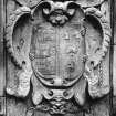 Detail of Hay and Nicolson armorial panel dated 1676 above doorway in S range's courtyard elevation.