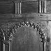 Interior.
Ground floor, hall, detail of seventeenth century timber panelling showing carved arcading with entablature.