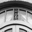 Detail of fanlight over sitting room French doors.