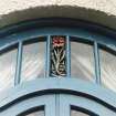 Detail of fanlight over sitting room French doors.