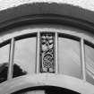 Detail of fanlight over sitting room French doors.