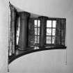 Interior.
First floor, entrance stair hall, detail of columniated N window.