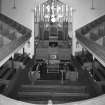 Interior. 
View from gallery looking towards the pulpit showing the steeply raked seating.