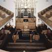 Interior. 
View from gallery looking towards the pulpit showing the steeply raked seating.