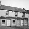 General view from W of bakery, including shop frontage.