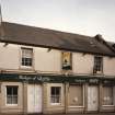 General view from W of bakery, including shop frontage.