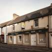 General view from S of bakery, including shop frontage.