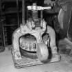 Interior. 
Detail of dough cutting machine, used to produce pieces of dough of a uniform size for batch baking.