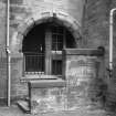 View of arched doorway to rear of building.