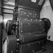 Alloa, Whins Road, Brewery, Mill Room area, first floor, interior
View showing Miag six roller, 3.3 tonnes per hour throughput malt/grist mill. Here the malt is ground in preparation for mashing. The resulting grist is stored in grist case 1