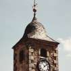 View of clock and spire on steeple.