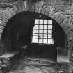 Detail of window and window seat in N wall of hall.