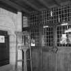 Interior. View of entrance porch showing glazed screen and tower stair door