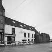 General view from S of SE side of building (facing North Street)