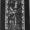 Interior. View of stained glass window of St Andrew