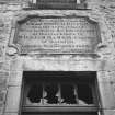 Detail of entrance bay showing commemorative panel.