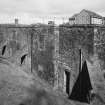 View of bonded warehouse from S. Formerly the textile mill weaving shed.