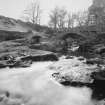 View from NNE showing flood damaged bridge.