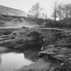 View from N showing flood damaged bridge.