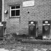 Detail of petrol pumps at garage.