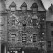 View of Darnley House, Stirling, from W showing the premises of a A Henderson Stationer and newsagent and the Bow Street Dairy