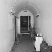 Interior. Courthouse ground floor view of East vaulted corridor from South looking towards the North staircase