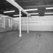 Interior of building 34.
View from W of W room on ground floor.