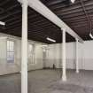 Interior of building 34.
View from W of E room on ground floor.