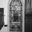 Interior.
Preaching auditorium, S wall, detail of stained glass window.