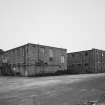 General view from N of 2-storeyed blocks [31A] including former canteen.