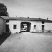 View of stables' W range from E.