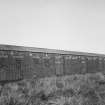 View from SE of surviving Quinan stove or drying house, building R19,  latterly converted to a narrow-gauge transit shed.