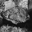 View of sculpted end of recumbent grave-slab.