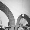 Interior, detail of brick arches and plaster decoration.