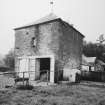 General view of W range of courtyard steading from S.