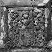 Detail of N wall of Jardine of Castlemilk memorial showing heraldic panel.